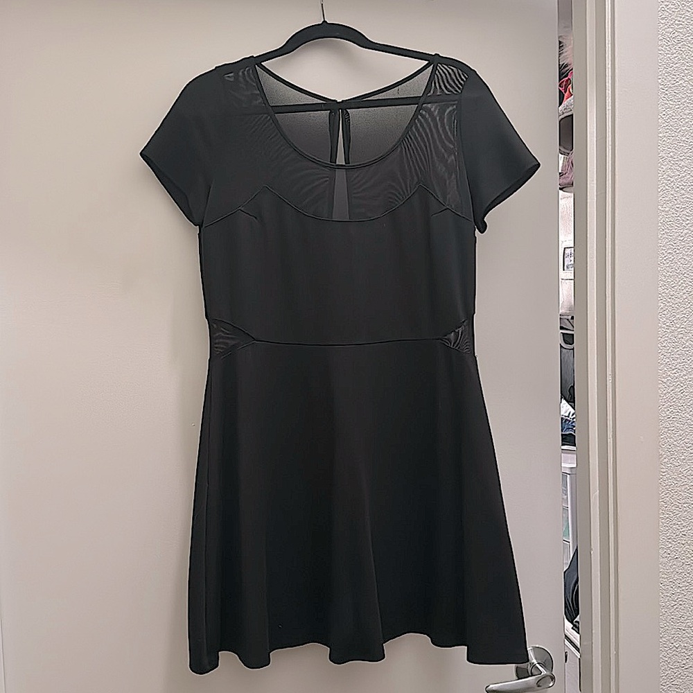 Like Minded black mini dress with mesh cutouts